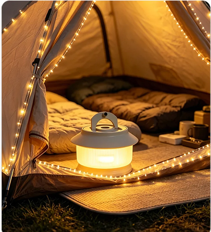 Twenty metre warm-white camping string light installed around a tent