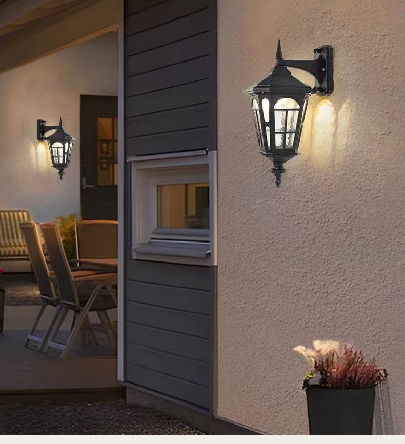 European solar wall lanterns installed on an outdoor villa terrace